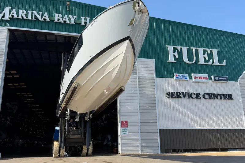 Slide: The Image of 2021 Monterey 385SE Super Express boat at Marina Bay Harbor service center. - 62