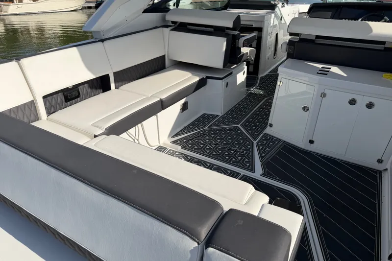 Slide: The Image of Luxurious interior of 2021 Monterey 385SE Super Express boat with sleek seating and cabinetry. - 25