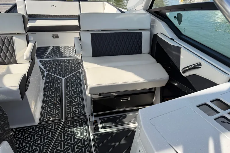 Slide: The Image of Interior of 2021 Monterey 385SE Super Express boat with luxurious seating and stylish flooring. - 30