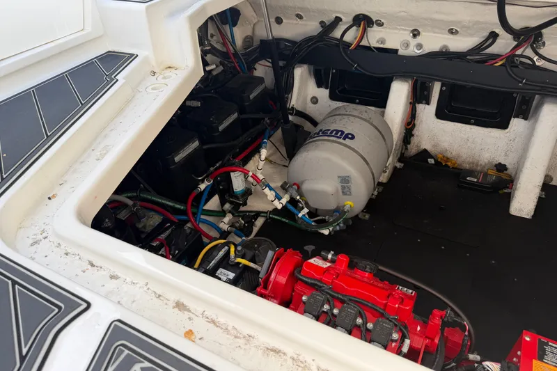 Slide: The Image of Engine compartment of 2021 Monterey 385SE Super Express boat, showing wiring and components. - 57