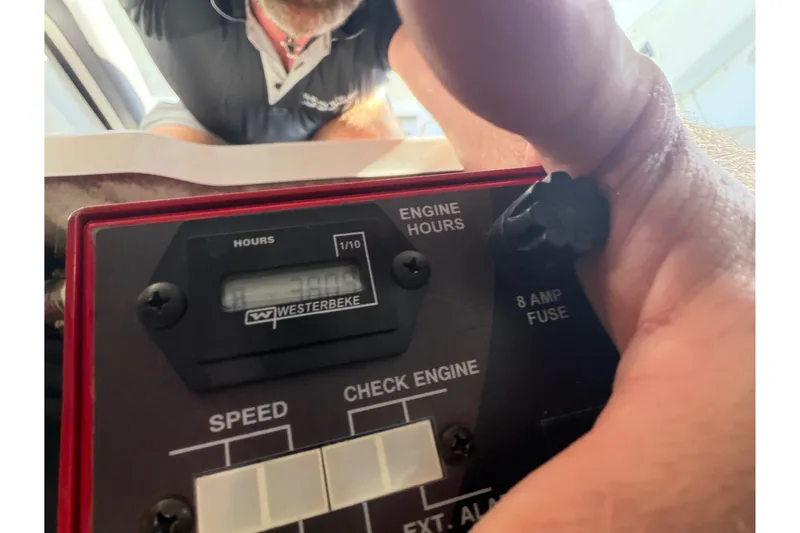 Slide: The Image of Close-up of engine hour meter on 2021 Monterey 385SE Super Express boat. - 59