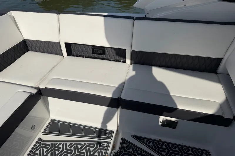 Slide: The Image of White and black seating on 2021 Monterey 385SE Super Express boat. - 28