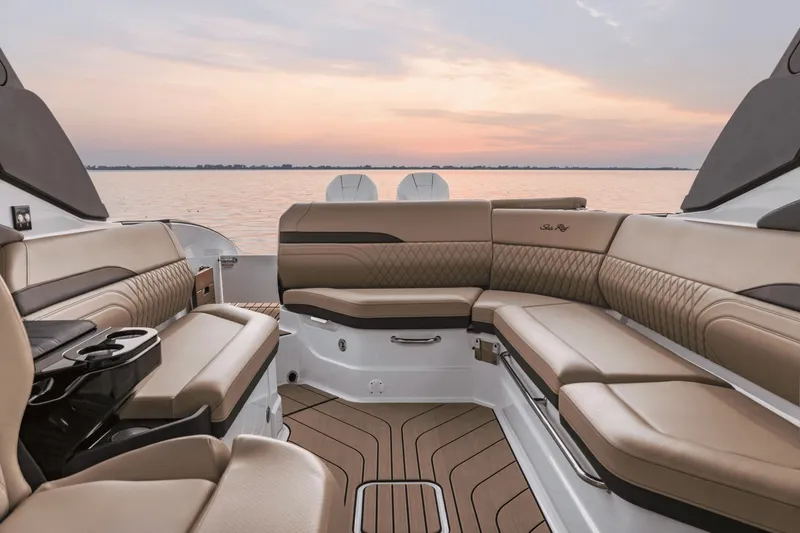 Slide: The Image of The image shows the luxurious interior of a Sea Ray SLX 280 Outboard with elegant seating. - 20