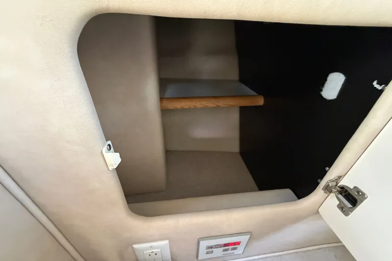 Slide: The Image of Interior storage compartment of a 1996 Sea Ray Sundancer 330 boat. - 39