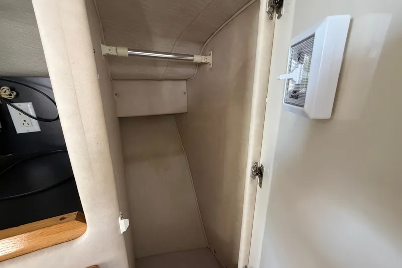 Slide: The Image of Interior closet space on a 1996 Sea Ray Sundancer 330 boat. - 38
