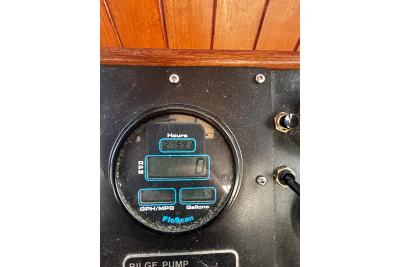 Slide: The Image of Instrument panel of 1983 Lord Nelson Victory Tug/Trawler, displaying engine hours and RPM. - 21