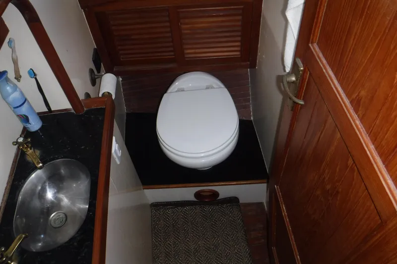 Slide: The Image of Compact bathroom in 1983 Lord Nelson Victory Tug/Trawler with sink and toilet. - 39