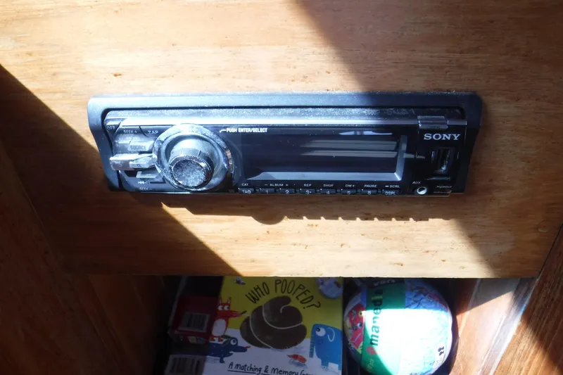 Slide: The Image of Sony stereo system in a 1983 Lord Nelson Victory Tug/Trawler boat interior. - 42