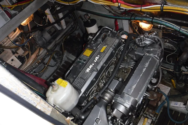 Slide: The Image of Engine room of 1983 Lord Nelson Victory Tug/Trawler with YANMAR engine, showcasing mechanical components. - 47