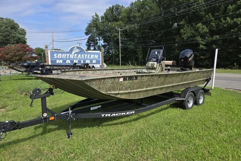 The Image of 2025 Tracker Grizzly 2072 CC boat on trailer at Southeastern Marine dealership. - 1