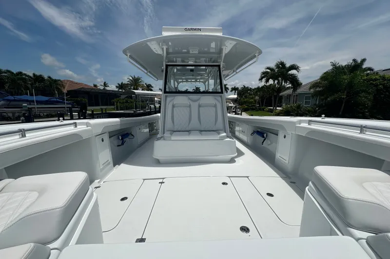 Slide: The Image of 2026 Yellowfin 39 Offshore boat with sleek white interior and advanced navigation system. - 23