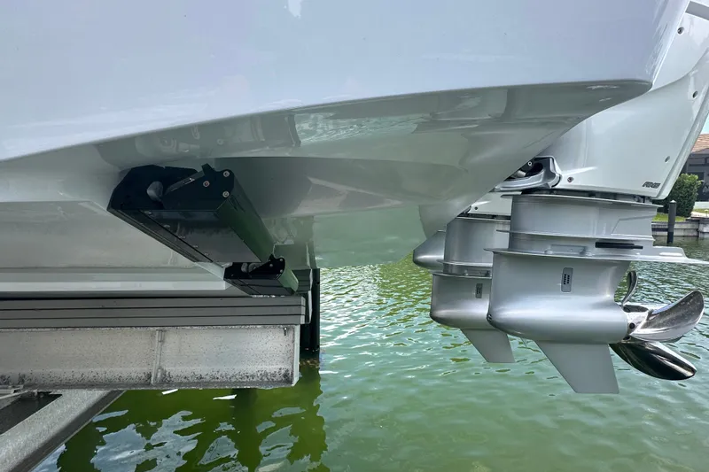 Slide: The Image of 2026 Yellowfin 39 Offshore boat with dual outboard motors in marina setting. - 9
