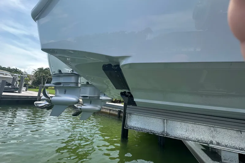 Slide: The Image of 2026 Yellowfin 39 Offshore boat with dual outboard motors docked in marina. - 20