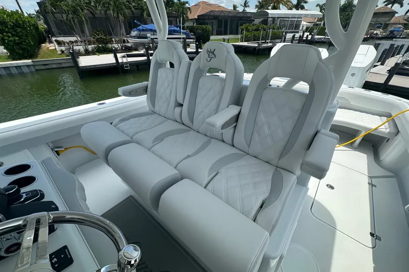 Slide: The Image of Luxurious seating on 2026 Yellowfin 39 Offshore boat, featuring diamond-stitched upholstery. - 42