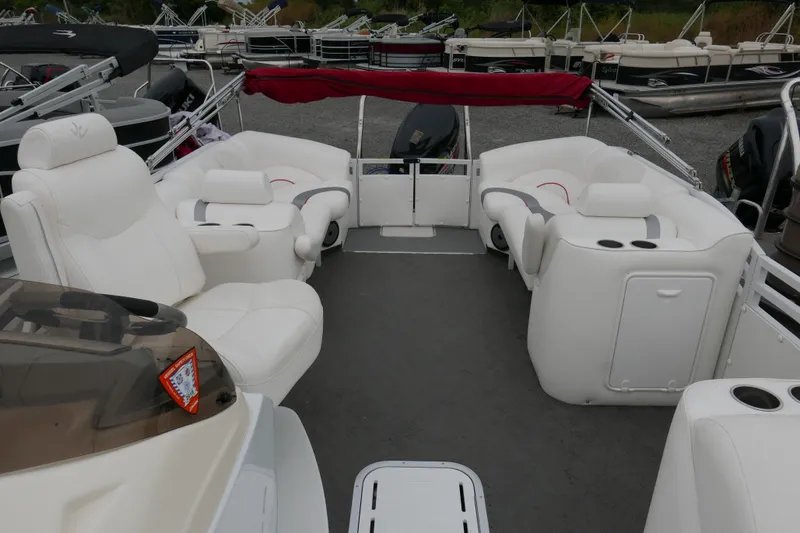 Slide: The Image of Luxurious 2011 JC 23 SunLounger TT pontoon boat with plush white seating and spacious layout. - 8