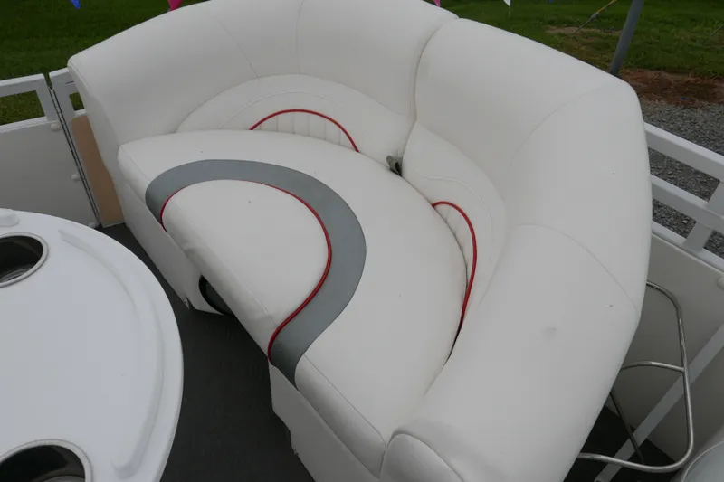 Slide: The Image of White seating on 2011 JC 23 SunLounger TT boat with cup holders. - 6
