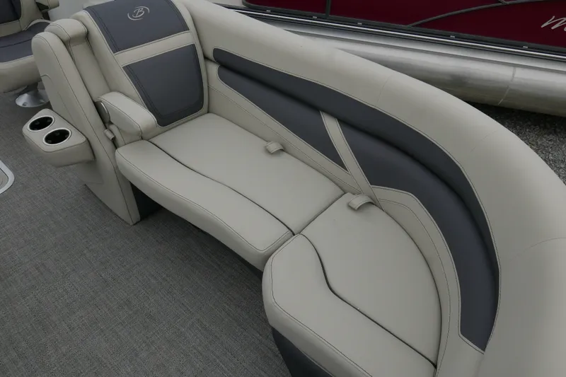 Slide: The Image of 2023 Barletta Cabrio C22UC boat interior with plush seating and cup holders. - 6