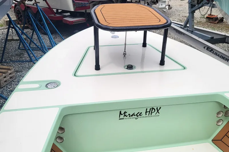 Slide: The Image of 2019 Maverick Mirage 18 HPX-V boat with elevated platform, displayed on trailer. - 11