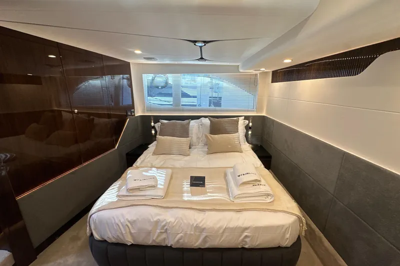 Slide: The Image of Luxurious bedroom interior of 2026 Fairline Targa 47 GT yacht with elegant bedding. - 40