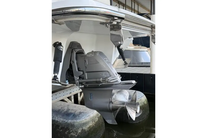 Slide: The Image of 2018 Cobalt R5 boat with Volvo Penta outdrive in a marina setting. - 4