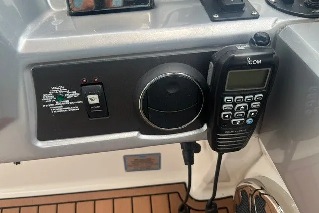 Slide: The Image of Control panel of a 2013 Chaparral 327 SSX boat with Icom radio. - 21