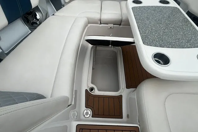 Slide: The Image of Interior of 2013 Chaparral 327 SSX boat with seating and table. - 9