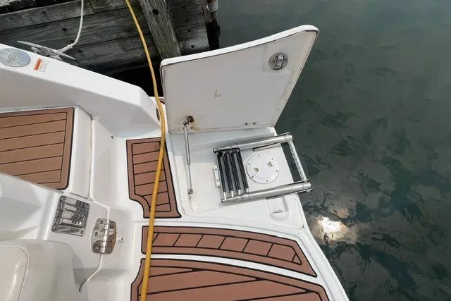 Slide: The Image of 2013 Chaparral 327 SSX swim platform with foldable ladder and teak-style decking. - 37