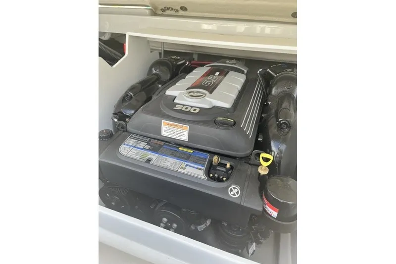 Slide: The Image of 2022 Crownline 240 SS boat engine, showcasing a powerful 6.2L 300 HP motor. - 6