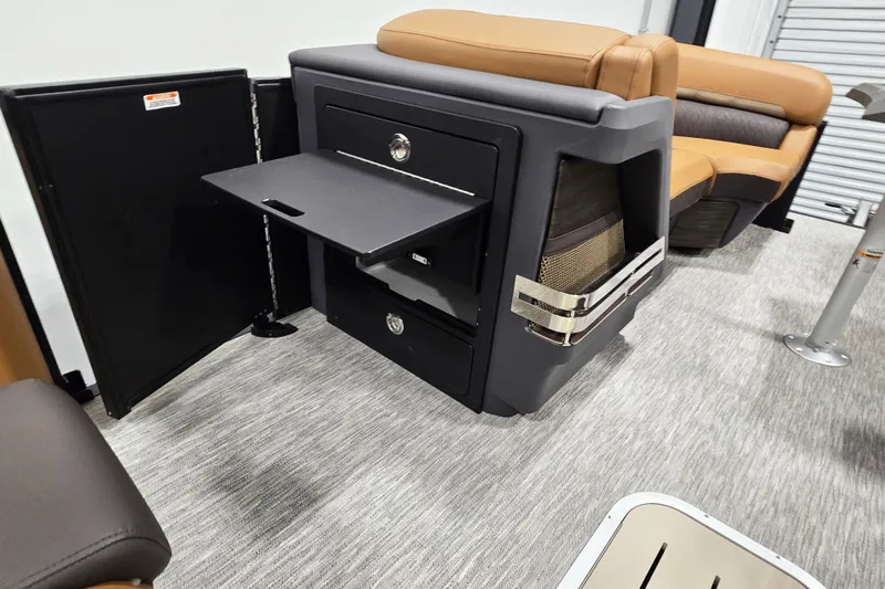Slide: The Image of Interior of 2026 Bennington 22M Open FSB boat with seating and storage features. - 8