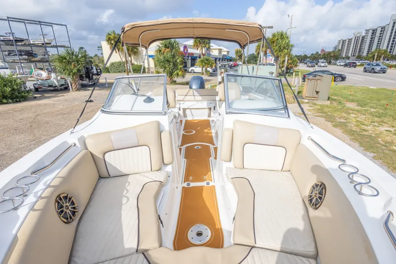 Slide: The Image of 2016 Sea Fox 226 Traveler boat interior with beige seating and canopy. - 33