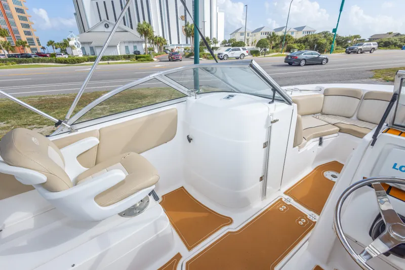 Slide: The Image of 2016 Sea Fox 226 Traveler boat interior with beige seating and modern design. - 28