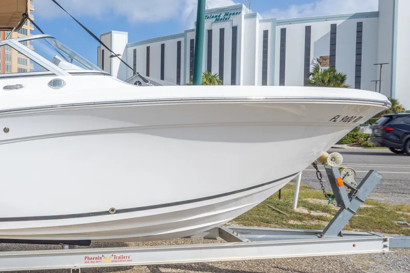 Slide: The Image of 2016 Sea Fox 226 Traveler boat on trailer, parked near Island House Hotel. - 22