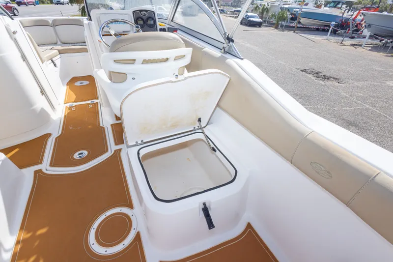 Slide: The Image of 2016 Sea Fox 226 Traveler boat interior with open storage compartment and seating. - 40