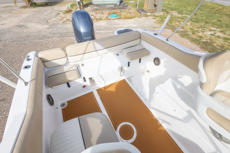 Slide: The Image of 2016 Sea Fox 226 Traveler boat interior with beige seating and Yamaha 175 engine. - 38