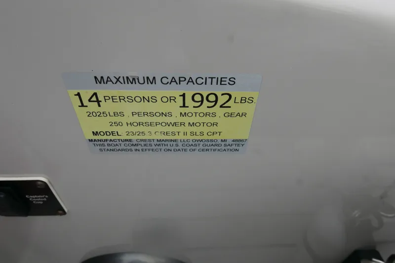 Slide: The Image of Capacity label on 2018 Crest II boat: 14 persons or 1992 lbs, 250 horsepower. - 12