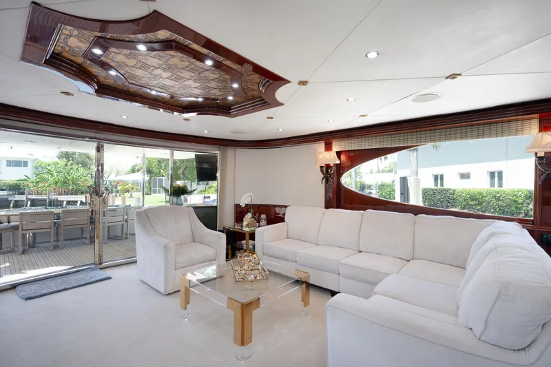 Slide: The Image of Luxurious interior of 2004 Lazzara 106 yacht with elegant seating and modern decor. - 64
