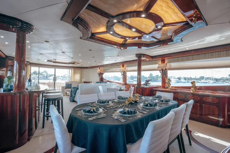 Slide: The Image of Luxurious interior of 2004 Lazzara 106 yacht with elegant dining area and bar. - 46