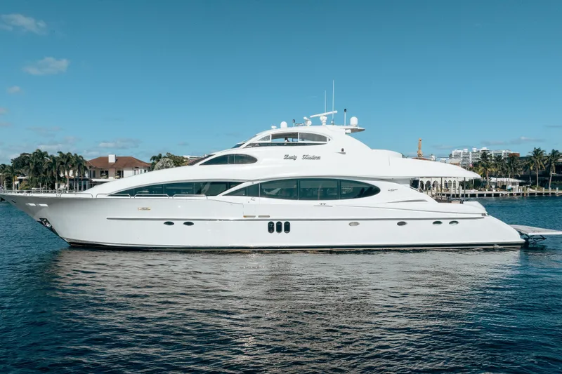 The Image of Luxurious 2004 Lazzara 106 yacht cruising on a sunny day, showcasing sleek design. - 0