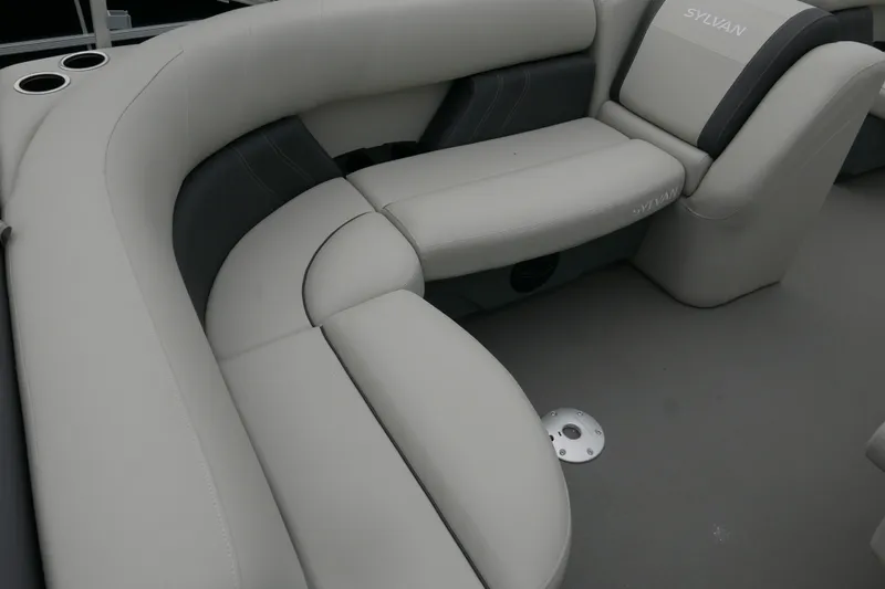 Slide: The Image of Luxurious seating on 2025 Sylvan Mirage 820 Cruise pontoon boat interior. - 11