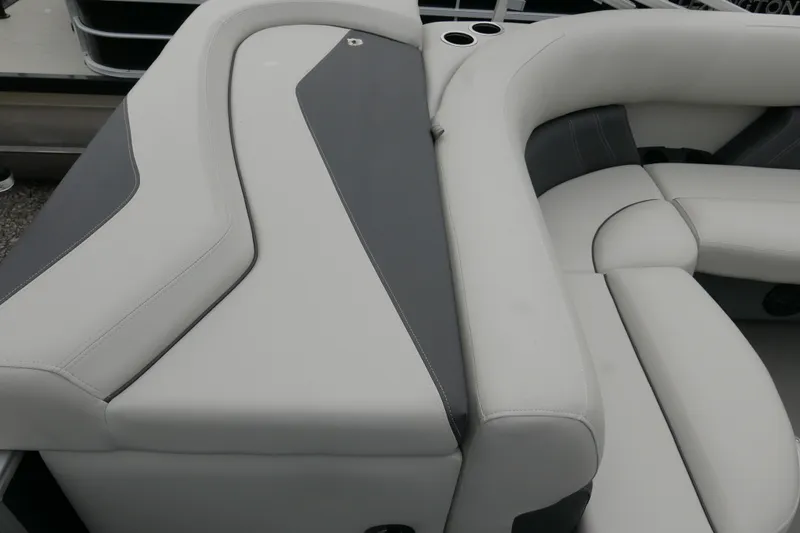 Slide: The Image of 2025 Sylvan Mirage 820 Cruise boat interior with sleek, modern seating design. - 12