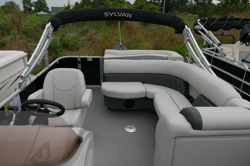 Slide: The Image of 2025 Sylvan Mirage 820 Cruise pontoon boat with spacious seating and sleek design. - 8