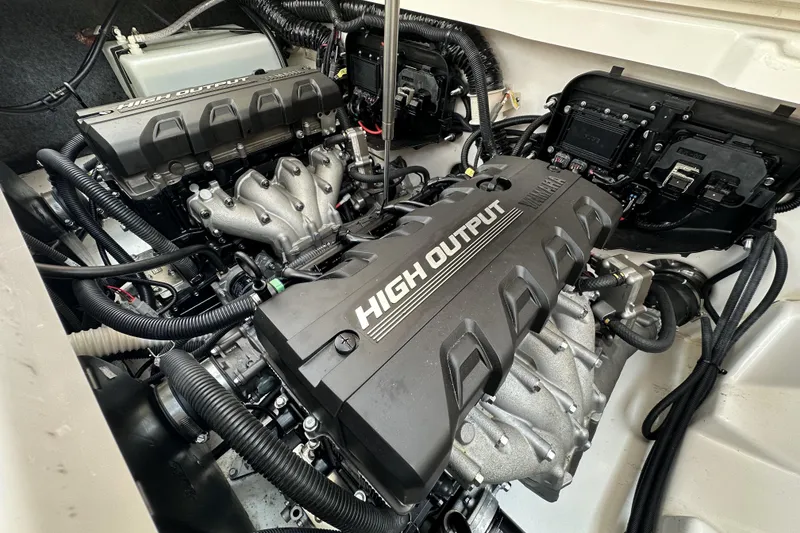 Slide: The Image of 2023 Yamaha Boats 252SE engine compartment showcasing high output engines and advanced components. - 13