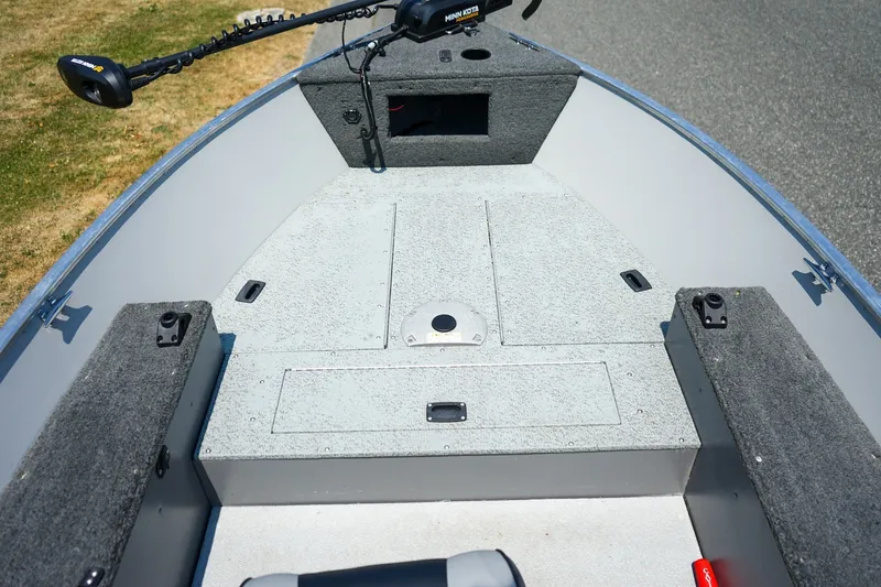 Slide: The Image of 2015 Lund 1400 Fury SS boat interior with Minn Kota trolling motor. - 9