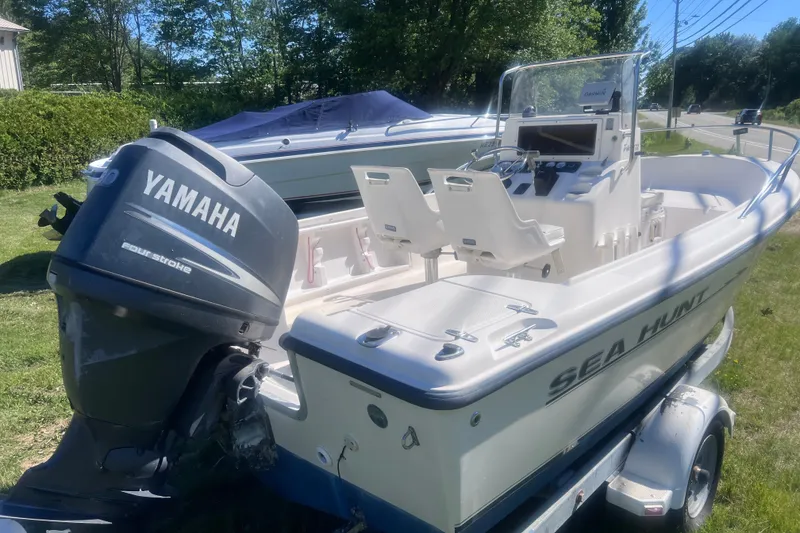 Slide: The Image of 2004 Sea Hunt Triton 177 boat with Yamaha outboard motor on trailer. - 8