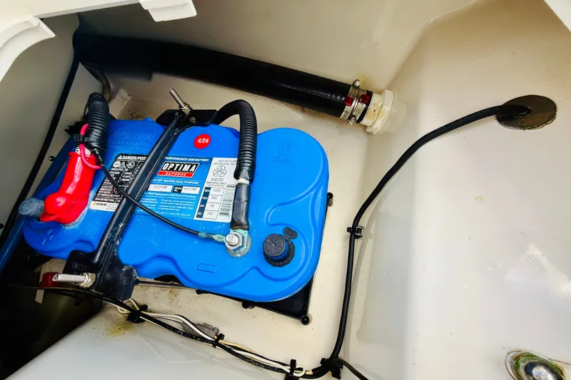 Slide: The Image of Battery compartment of a 2018 Boston Whaler 240 Dauntless with Optima marine battery. - 33