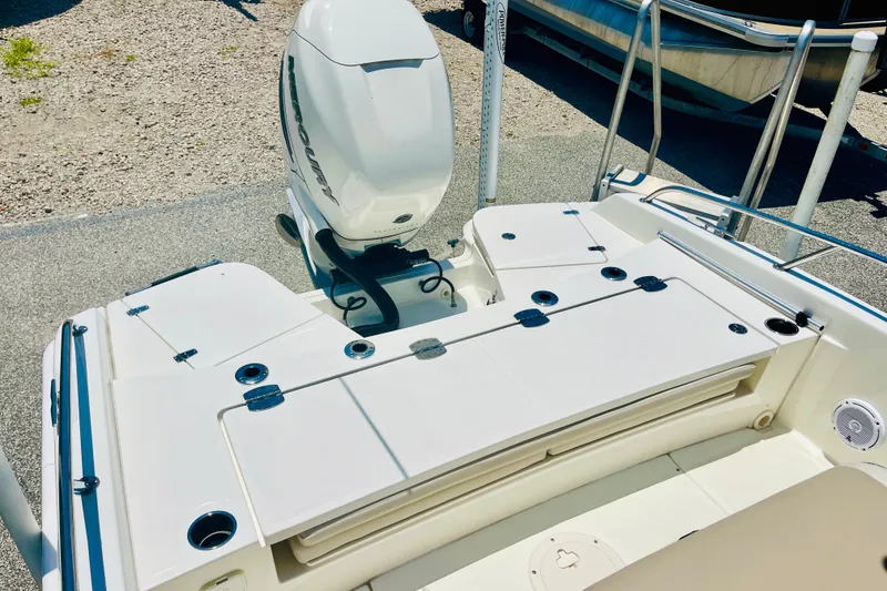 Slide: The Image of 2018 Boston Whaler 240 Dauntless boat with Mercury outboard engine, rear deck view. - 12