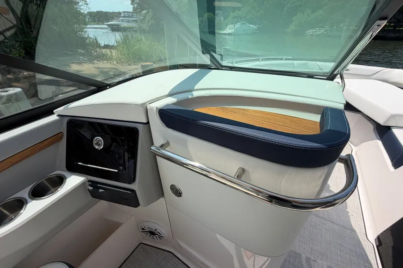 Slide: The Image of Interior of 2027 Regal LX9 boat with sleek design and cup holders. - 17