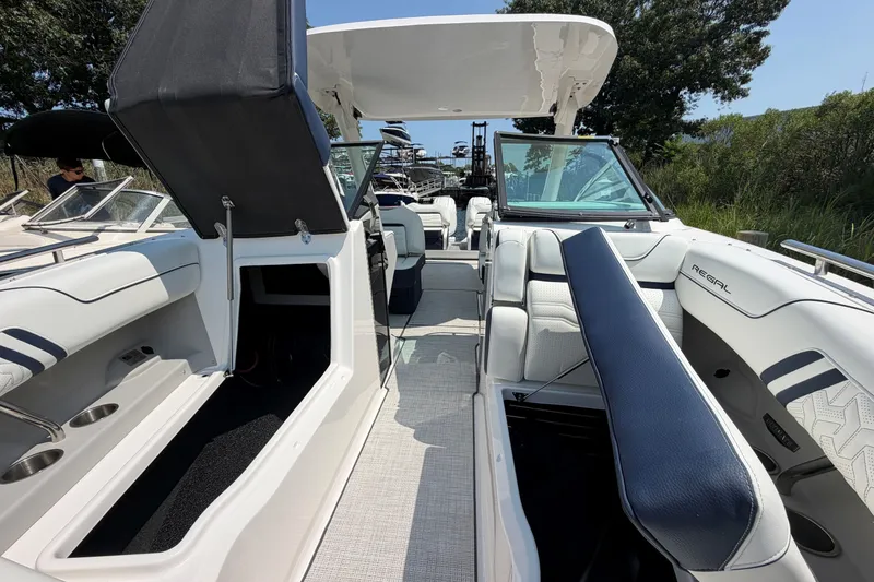 Slide: The Image of 2027 Regal LX9 boat interior with luxurious seating and modern design features. - 29