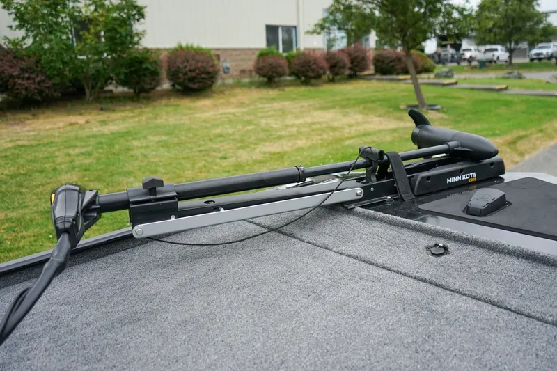 Slide: The Image of 2026 Tracker Bass Tracker Classic CC with Minn Kota trolling motor on deck. - 13