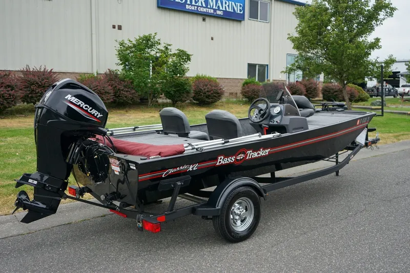 Slide: The Image of 2026 Tracker Bass Tracker Classic CC boat with Mercury engine on trailer. - 3